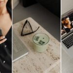 Eine Frau im schwarzen Blazer hält ein Smartphone; daneben liegen Brille, Kerze und ein Laptop auf einem Sofa.